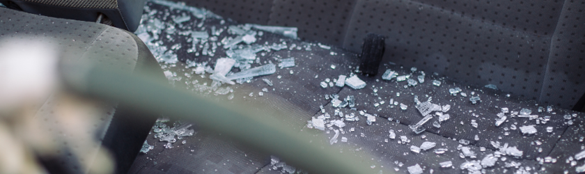 shattered glass on car seat after a car accident