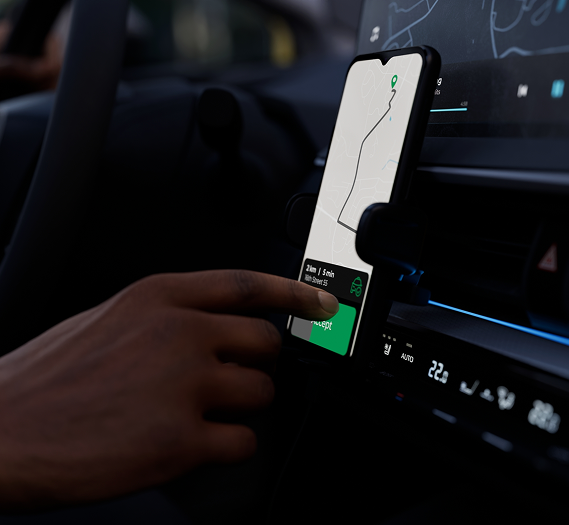 driver tapping on his ride share map